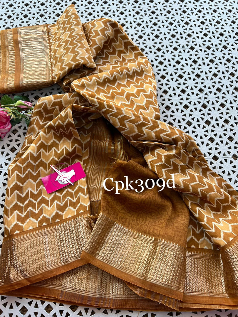 Classic Bronze Handloom Tussar Saree Soft Silk With Zari Edge And Printed Motifs