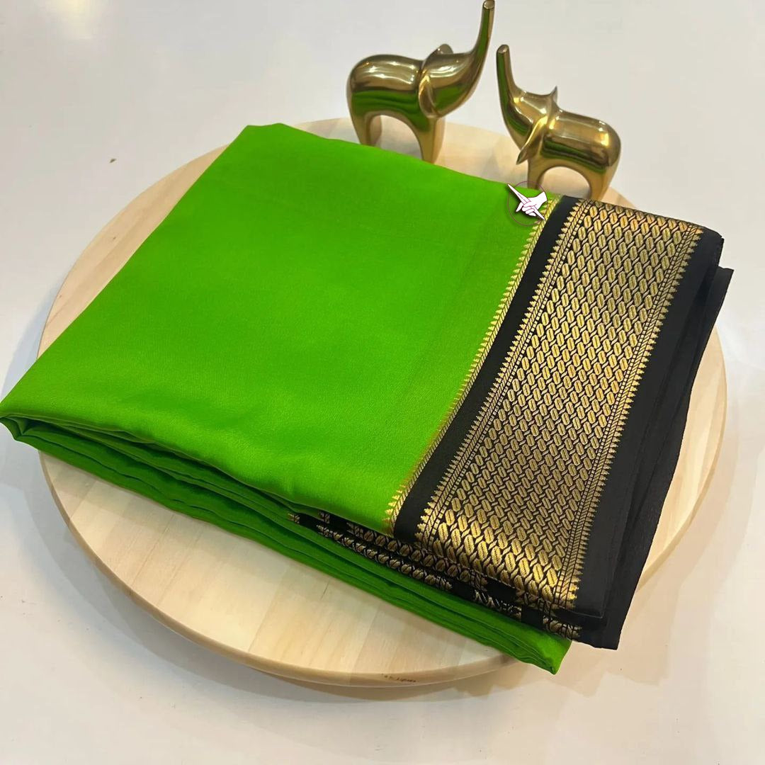 Exclusive Zari Border Green Colour Plain Mysore Silk Saree.