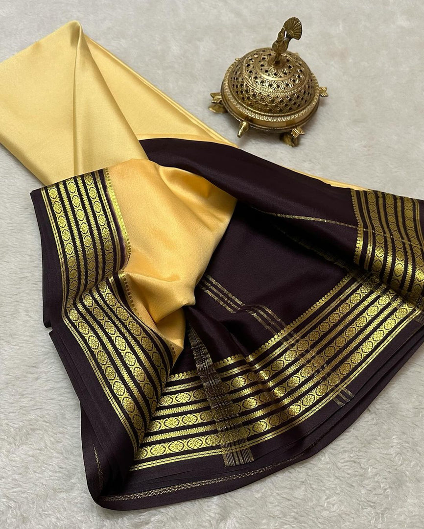 Exclusive Zari Border Green Colour Plain Mysore Silk Saree.