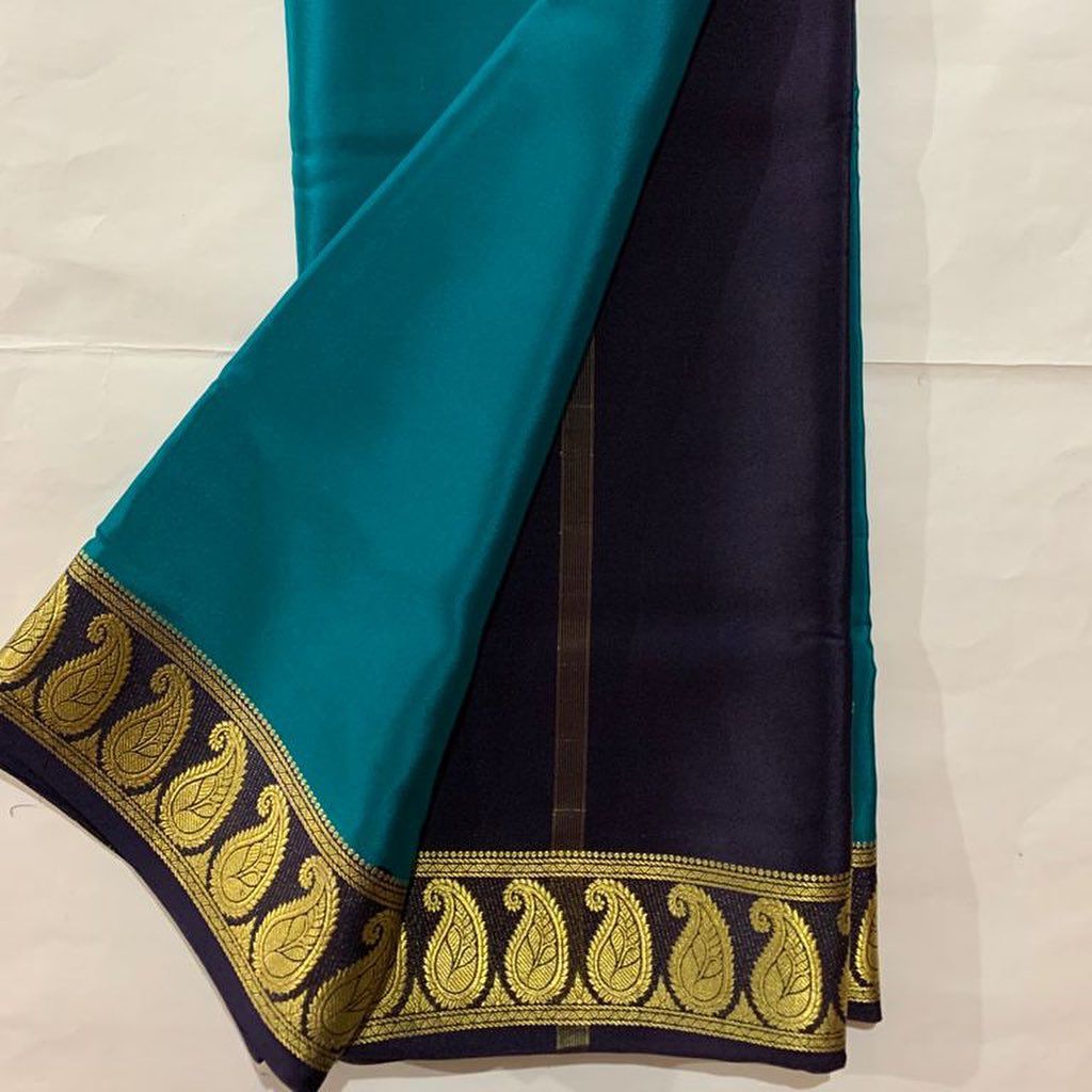 Exclusive Zari BorderSky Blue nd Purple Colour Plain Mysore Silk Saree.