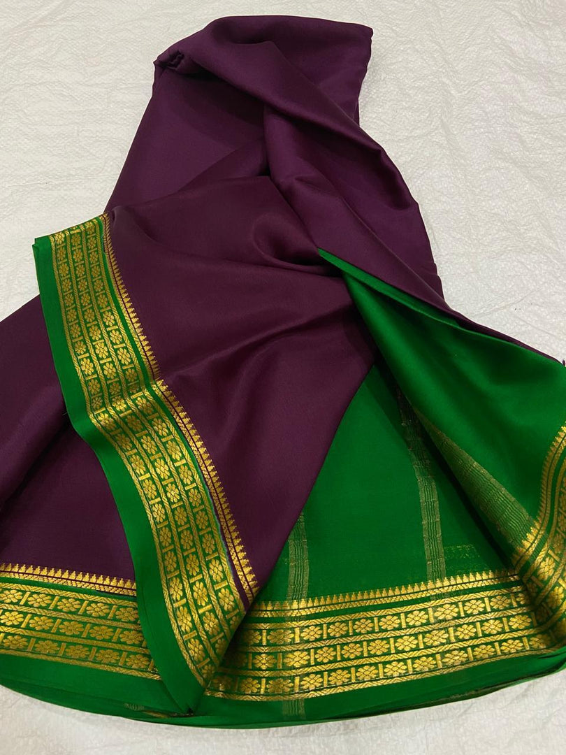Charming Purple And Light Green Traditional Semi Mysore Saree With Zari Woven Borders
