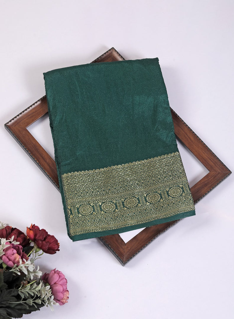 Crafted to shine designed to dazzle with this Botter green Crepe Mysore Silk Saree