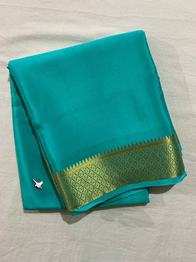 Captivating Sky Blue Mysore Silk Saree With Plain Body Zari Border And Designer Blouse