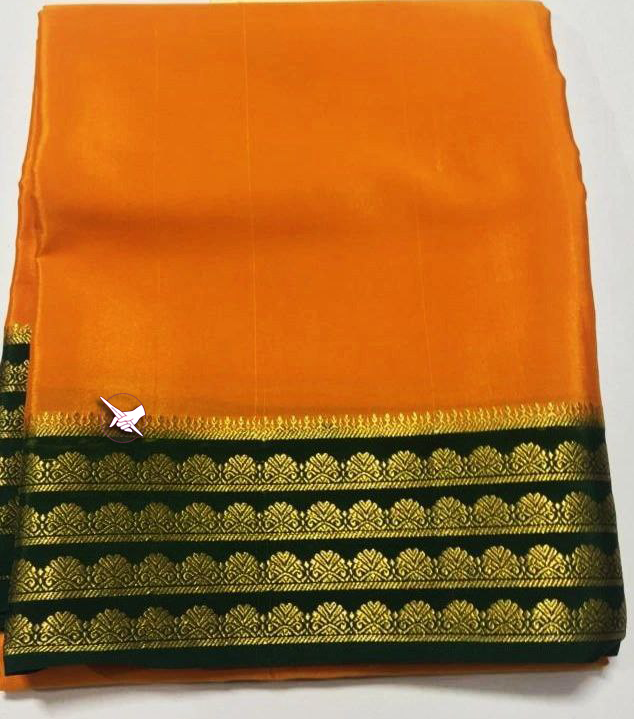Exclusive Zari Border Orange nd Green Colour Plain Mysore Silk Saree.