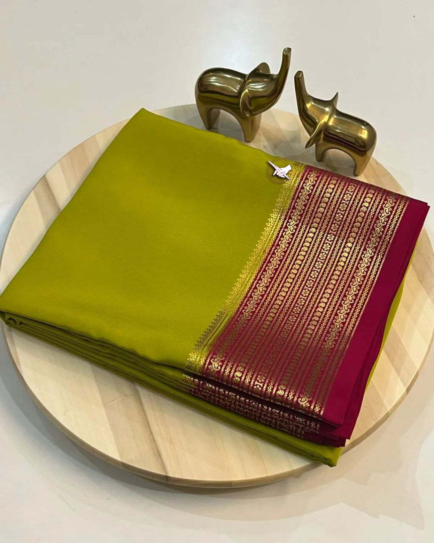 Exclusive Zari Border Green nd Maroon Colour Plain Mysore Silk Saree.