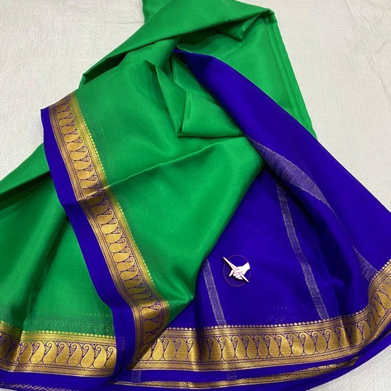 Exclusive Zari Border Green nd Purple Colour Plain Mysore Silk Saree.