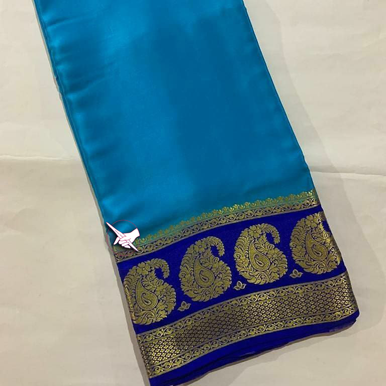 Exclusive Zari Border Navy Blue Colour Plain Mysore Silk Saree.