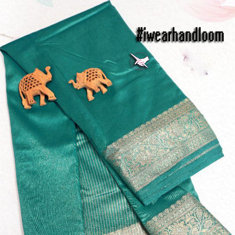 Engaging Teal Elegance Tissue Weaving Silk Saree