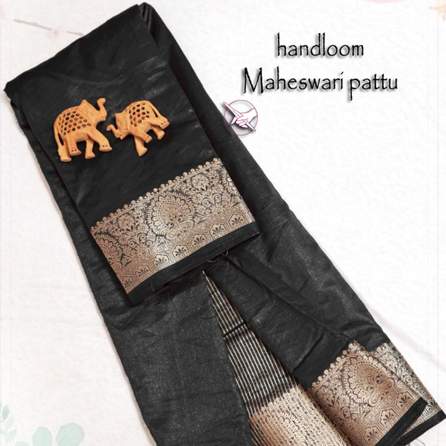 Black Glow Tissue Silk Saree With Elegant Weaving Accents