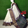 Graceful White Silk Saree With Zari Kanchi Border And Patola Blouse