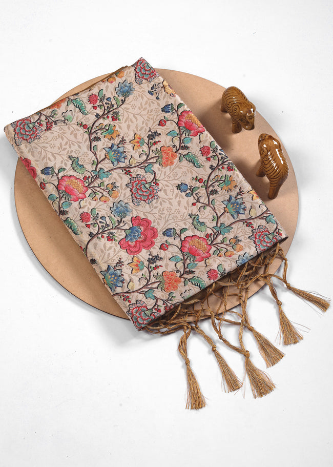 Experience the legacy of the soft silk saree with floral print