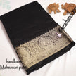 Black Glow Tissue Silk Saree With Elegant Weaving Accents