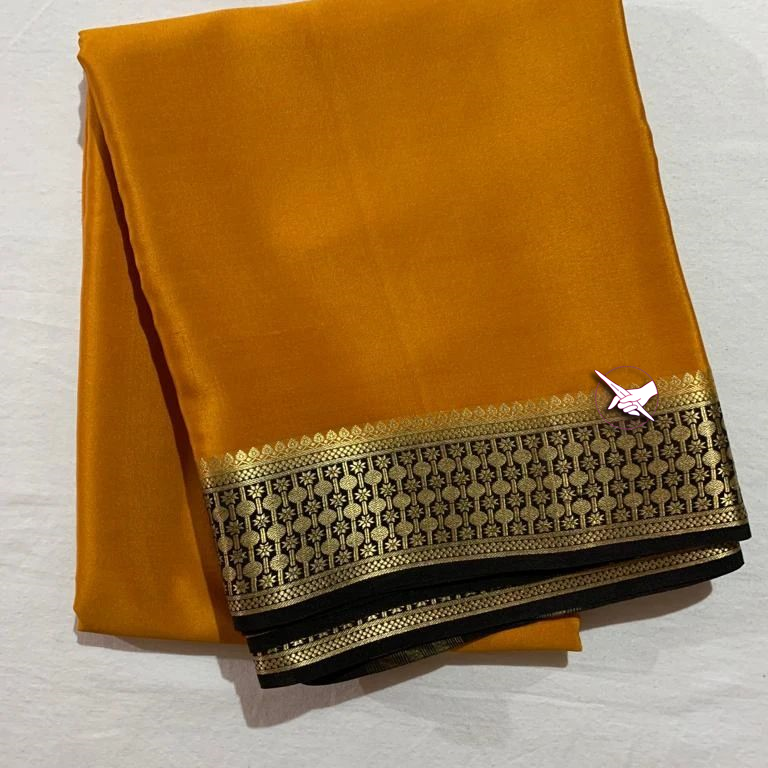 Exclusive Zari BorderOrange  Colour Plain Mysore Silk Saree.
