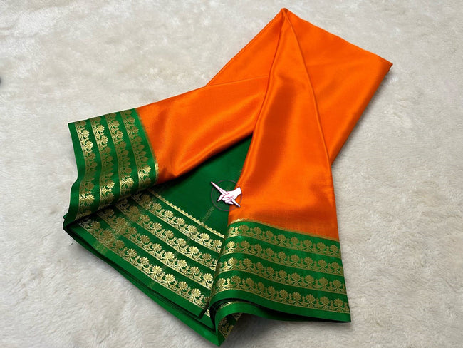 Exclusive  Zari Border Orange nd Green  Colour Plain Mysore Silk Saree.