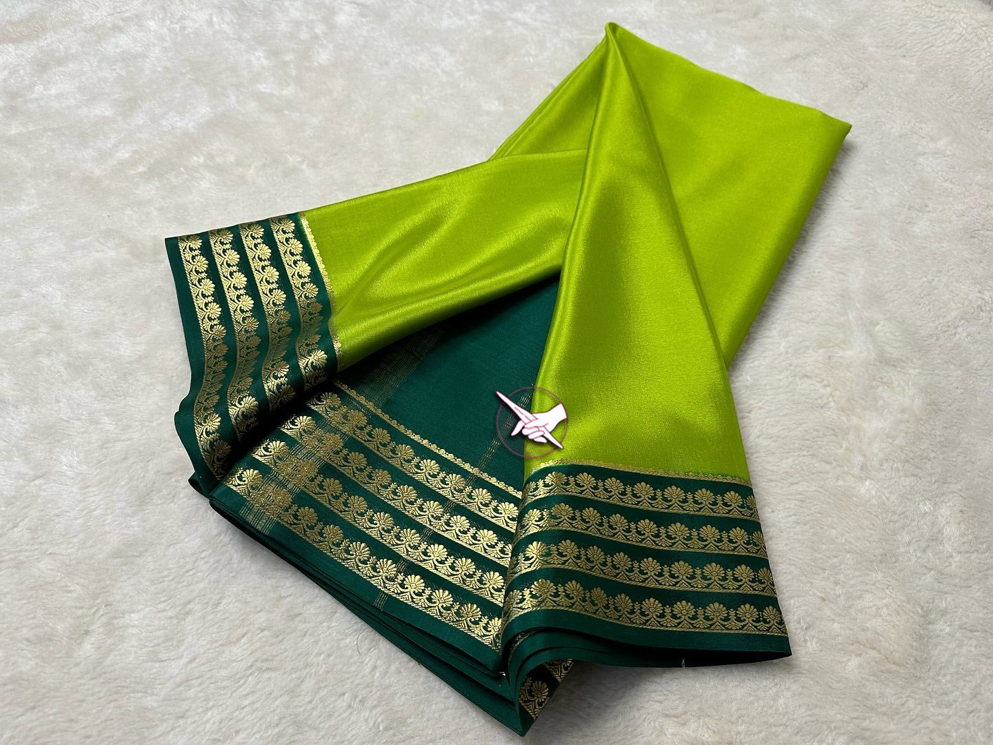 Exclusive  Zari Border Green Colour Plain Mysore Silk Saree.