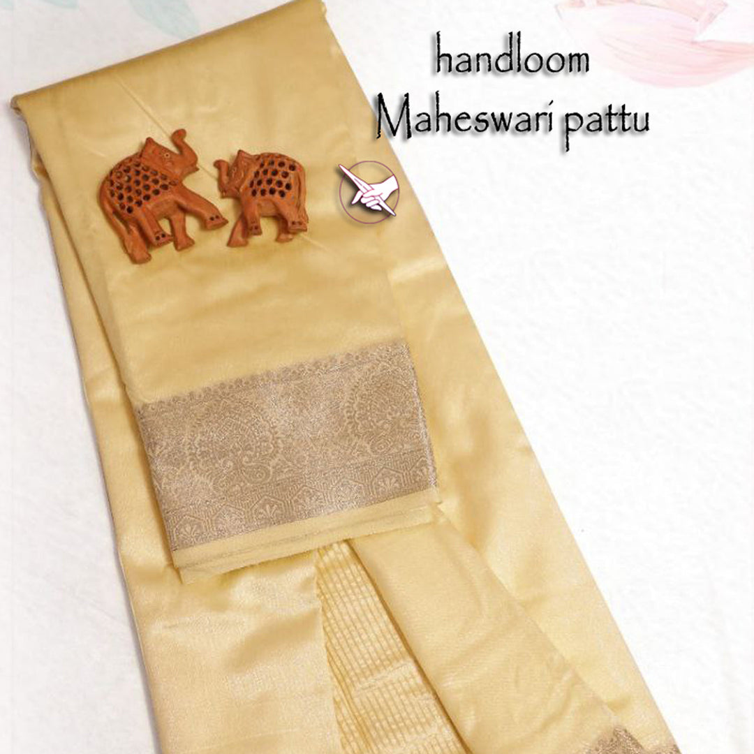 Sheer Heritage Beige Tissue Silk Saree With Artistic Weaves