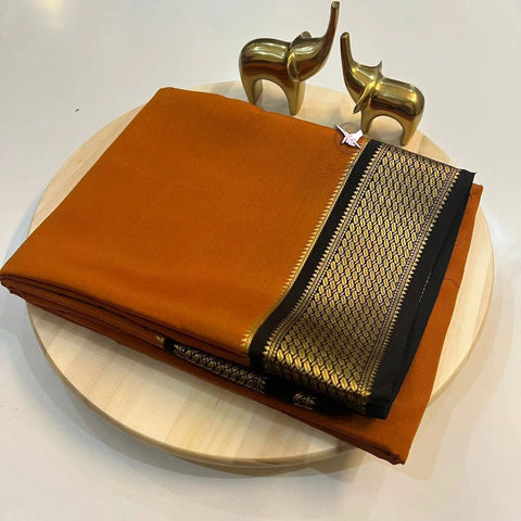 Exclusive Zari Border Orange  Colour Plain Mysore Silk Saree.