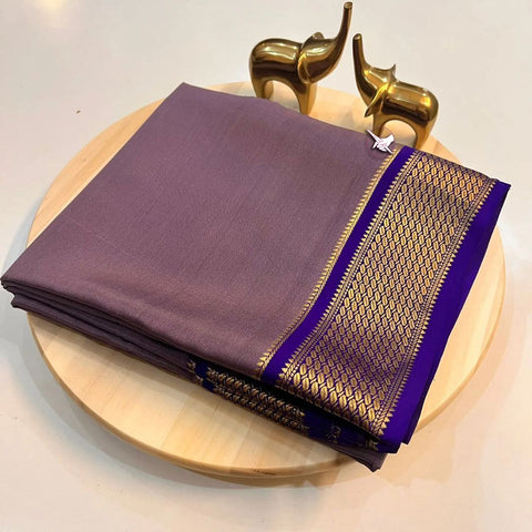 Exclusive  Zari Border silver nd Purple  Colour Plain Mysore Silk Saree.