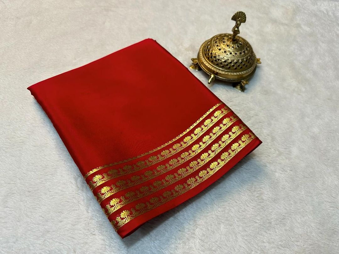 Exclusive Zari Border Orange   Plain Mysore Silk Saree.
