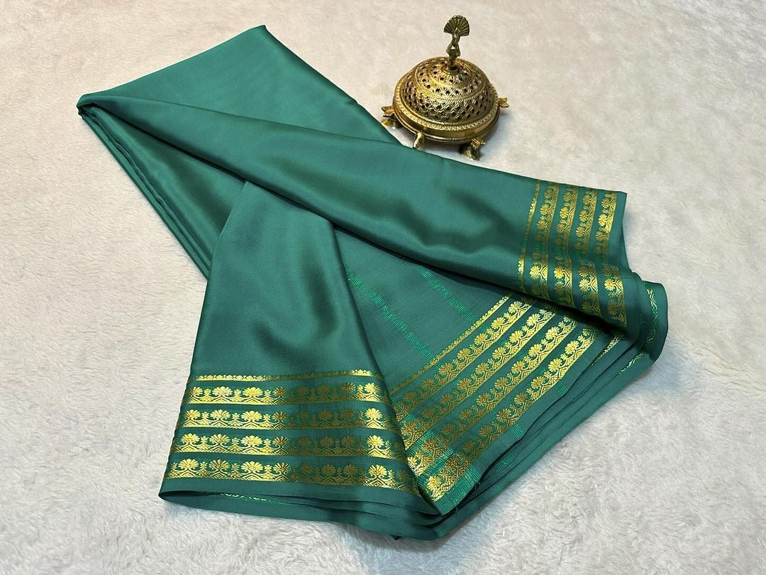 Exclusive Zari Border Orange   Plain Mysore Silk Saree.
