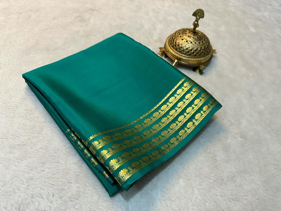 Exclusive Zari Border Orange   Plain Mysore Silk Saree.