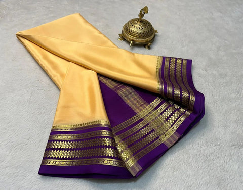 Exclusive  Zari Border Beige Colour Plain Mysore Silk Saree.