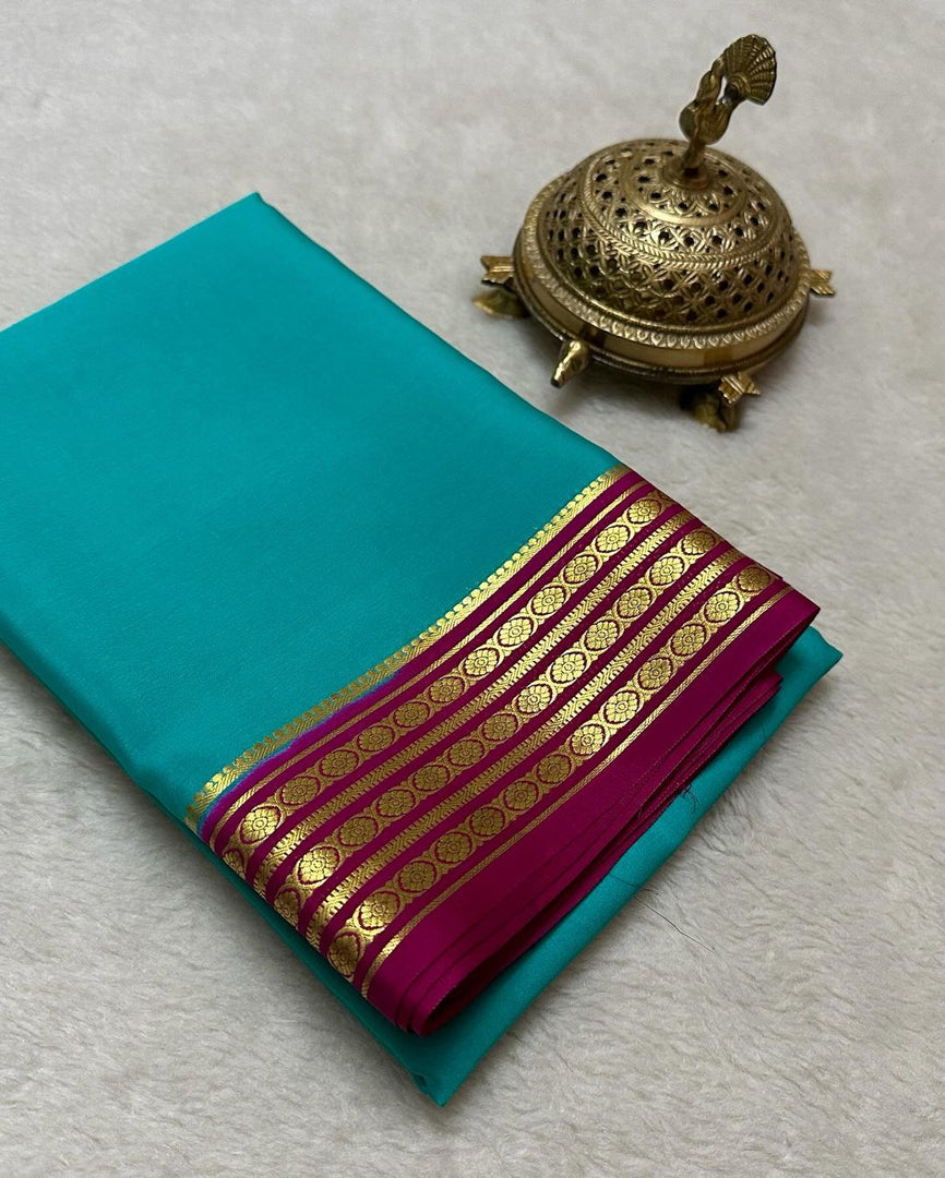 Exclusive Zari Border Sky Blue Colour Plain Mysore Silk Saree.