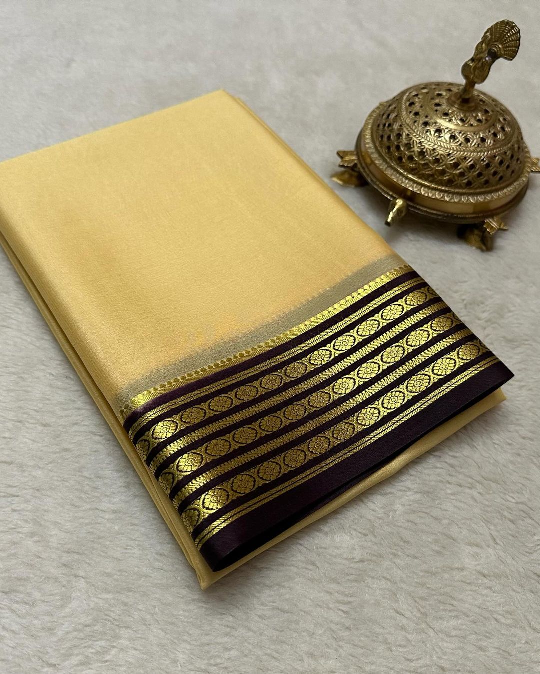 Exclusive Zari Border Green Colour Plain Mysore Silk Saree.