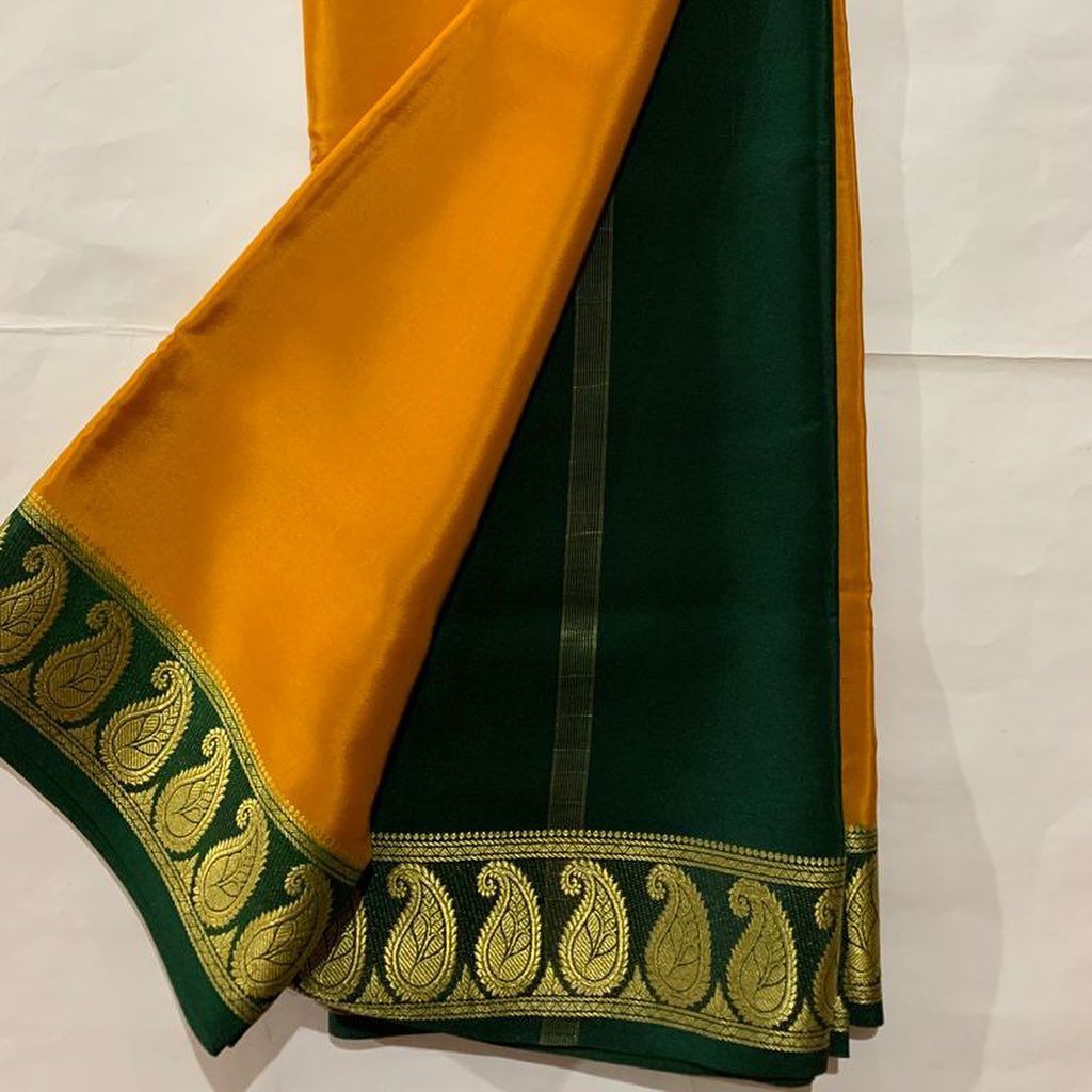 Exclusive Zari Border Orange Colour Plain Mysore Silk Saree.