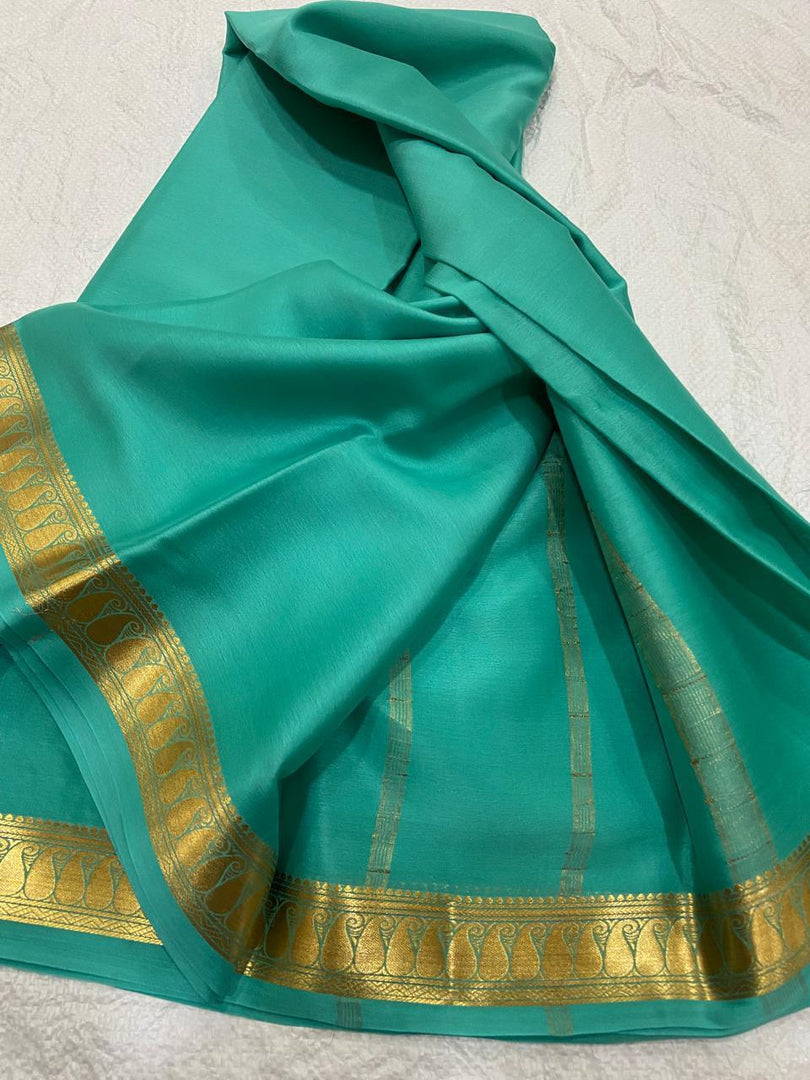 C GREEN SEMI SOFT SILK SAREE