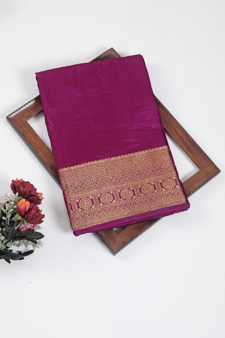Luxury in a drape tradition in every pleat with this Golden Zari work Crepe Mysore Silk Saree