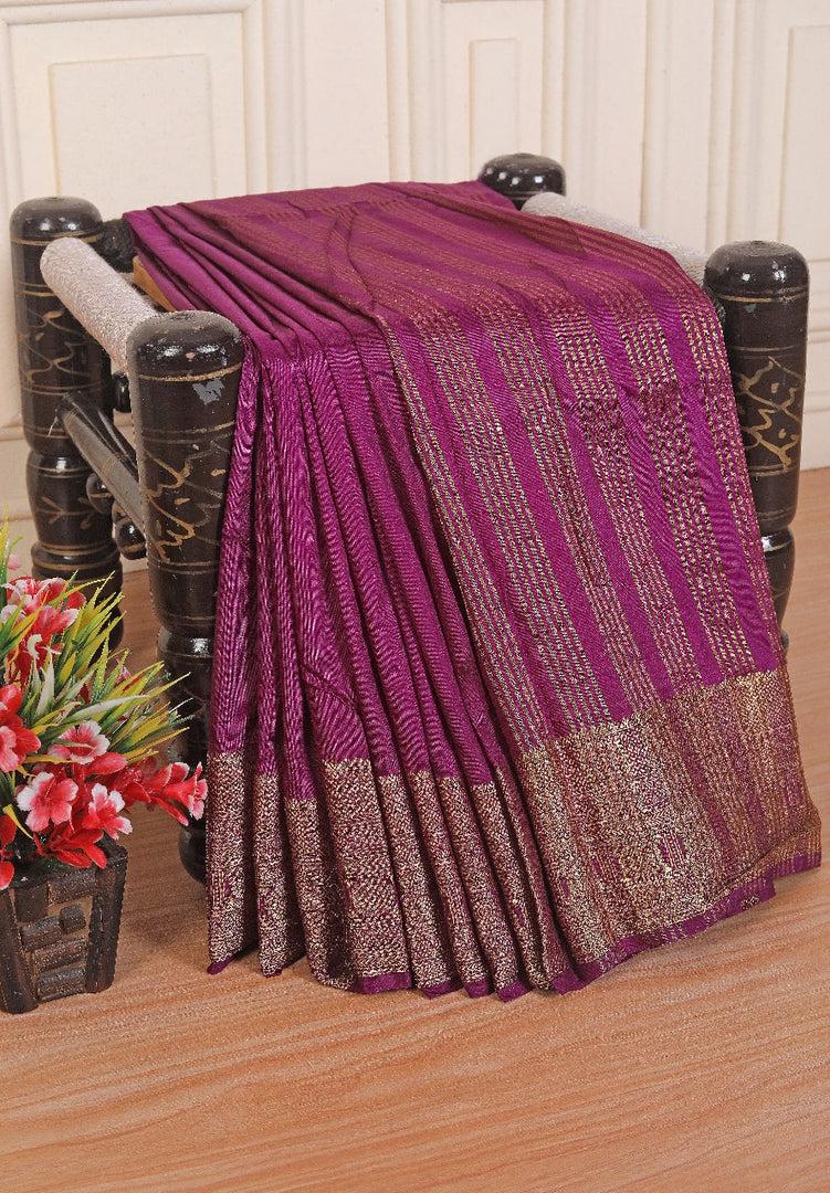 Luxury in a drape tradition in every pleat with this Golden Zari work Crepe Mysore Silk Saree
