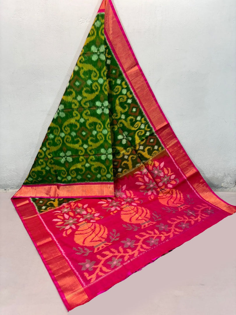 Unravel elegance one thread at a time of this Bottal green ikkat silk saree