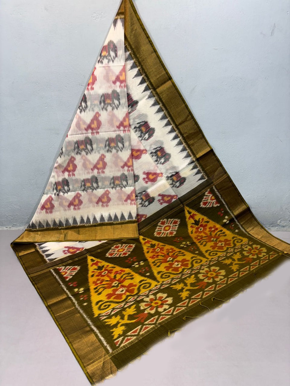 Grace in Every Thread, Luxury in Every Drape with this Ikkat Silk Saree