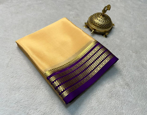 Exclusive  Zari Border Beige Colour Plain Mysore Silk Saree.