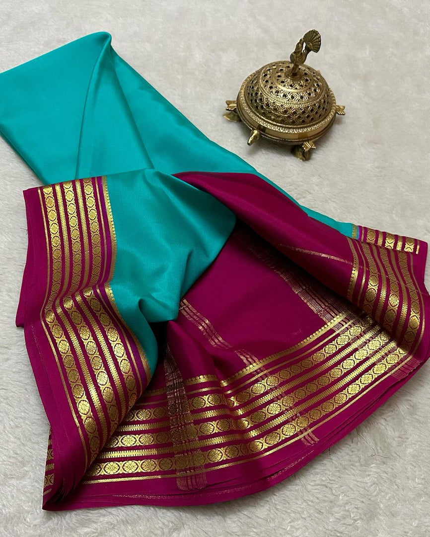 Exclusive Zari Border Sky Blue Colour Plain Mysore Silk Saree.