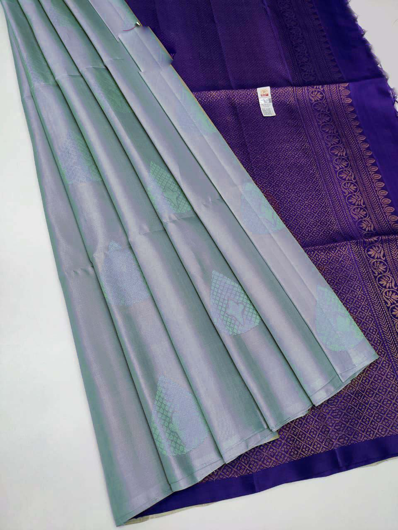 Trendy Silver Silk Saree With Premium Woven Craft For Celebrations