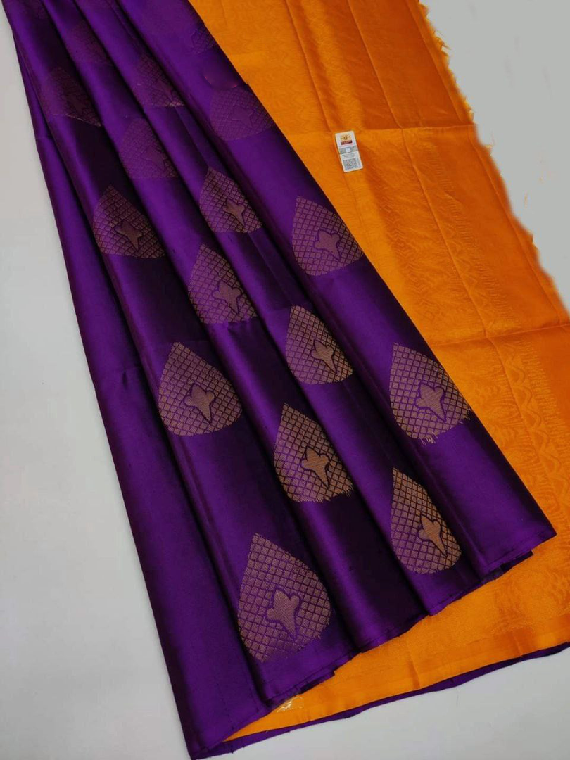 Regal Purple Silk Saree Featuring Rich Traditional Weaving Design