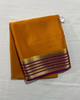 Exclusive  Zari Border Orange nd Purple  Colour Plain Mysore Silk Saree.