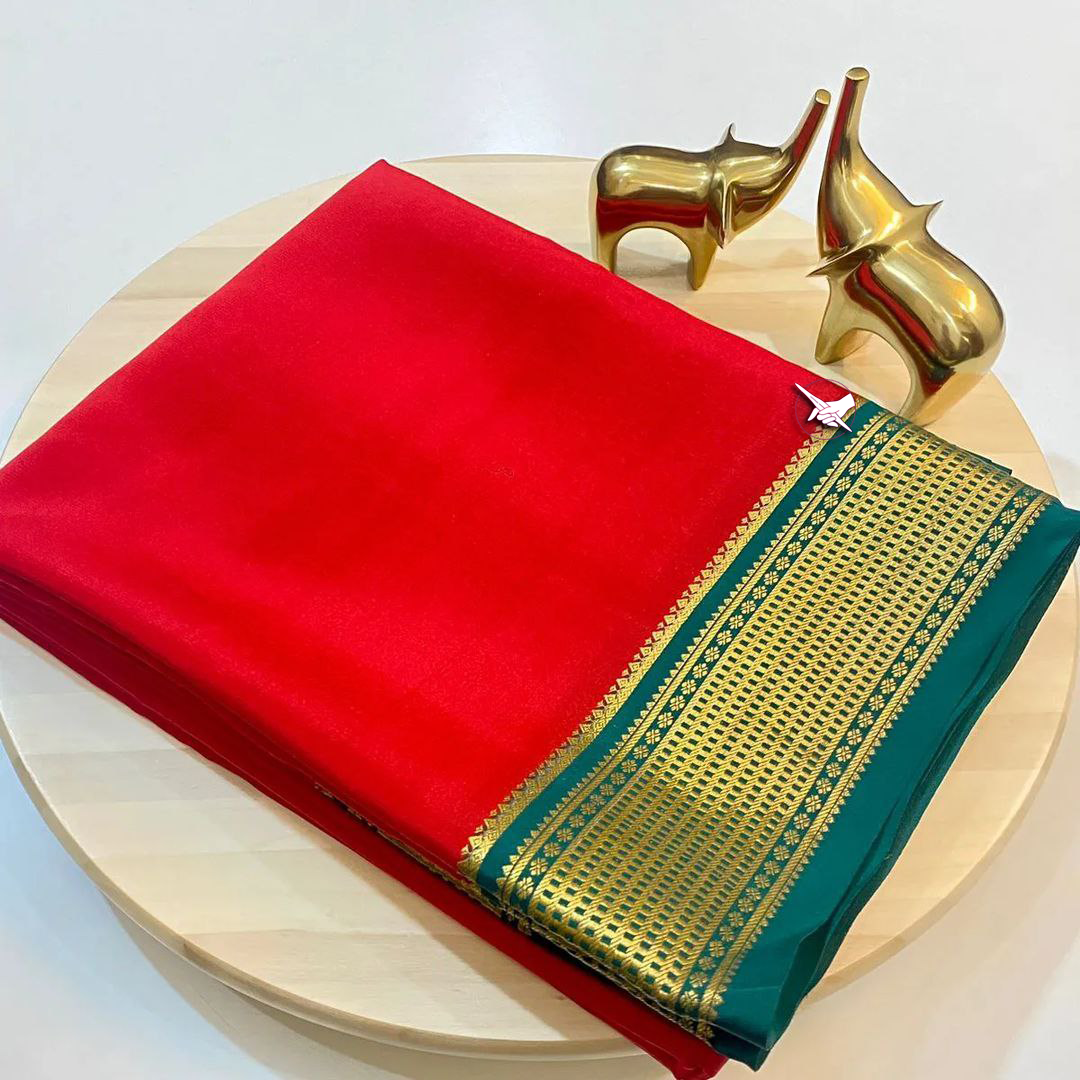 Classic Festive Saree In Red And Green Plain Mysore Silk With Zari Border And Designer Blouse