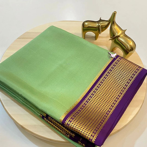 Exclusive Zari Border Green nd Purple  Colour Plain Mysore Silk Saree.
