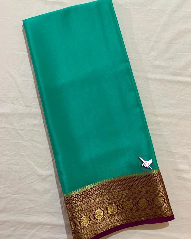 Exclusive  Zari Border Green Plain Mysore Silk Saree.