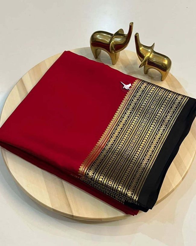 Exclusive Zari Border Light  Red nd Black  Colour Plain Mysore Silk Saree.