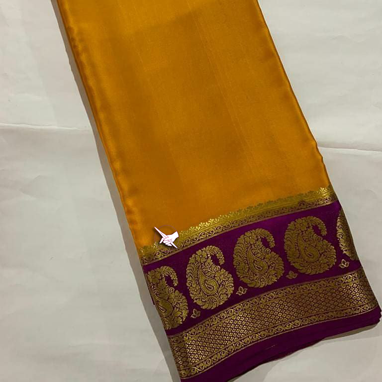 Exclusive Zari Border Yellow nd Pink Colour Plain Mysore Silk Saree.