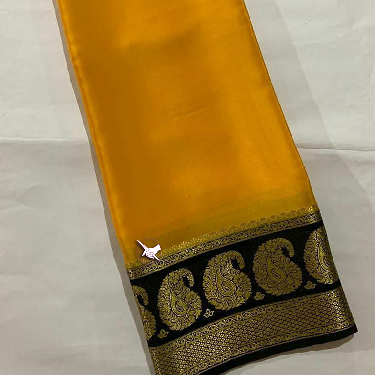 Exclusive Zari Border Yellow nd Green Colour Plain Mysore Silk Saree.