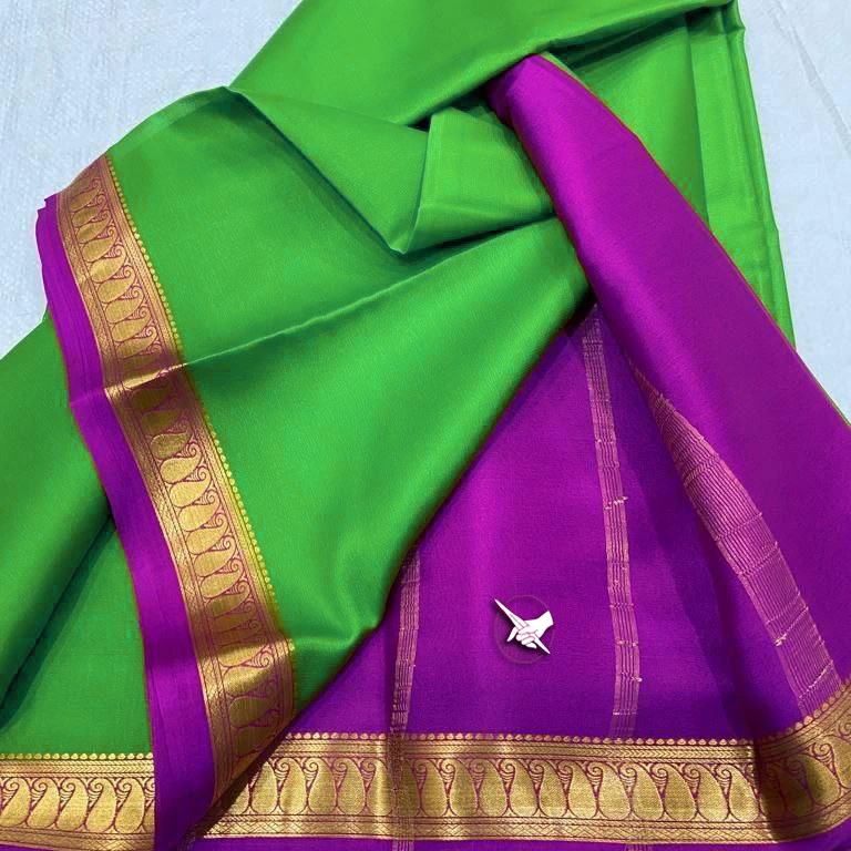 Exclusive  Zari Border Green nd Purple  Colour Plain Mysore Silk Saree.