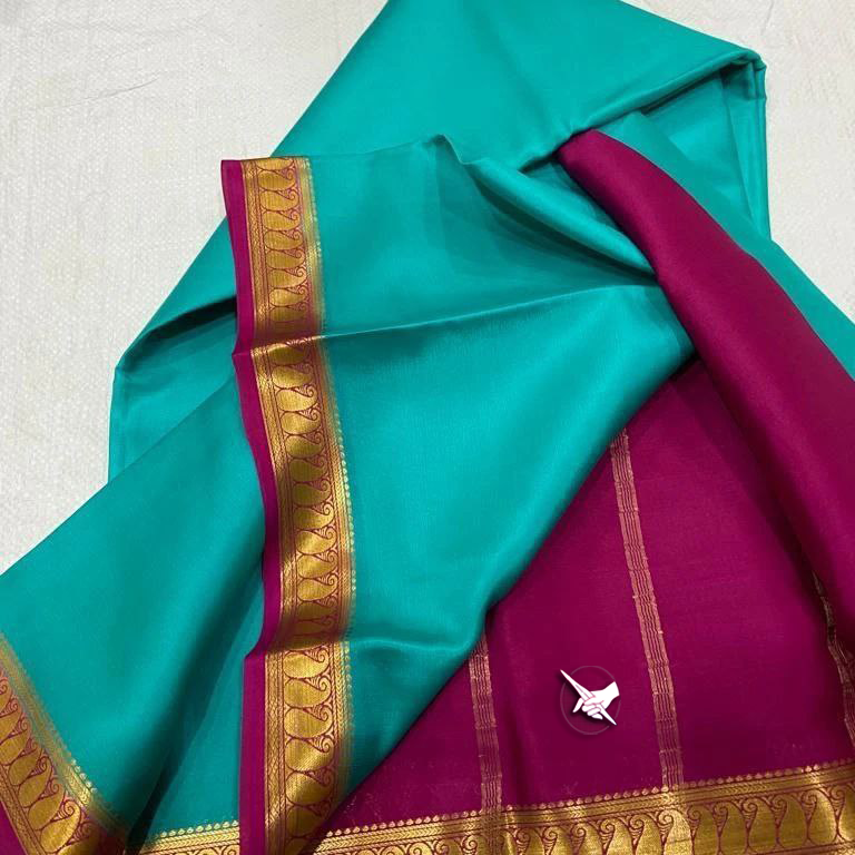 Exclusive Zari Border Sky Blue nd Purple Colour Plain Mysore Silk Saree.