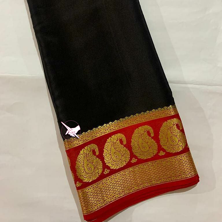 Exclusive Zari Border Black nd Peach Colour Plain Mysore Silk Saree.