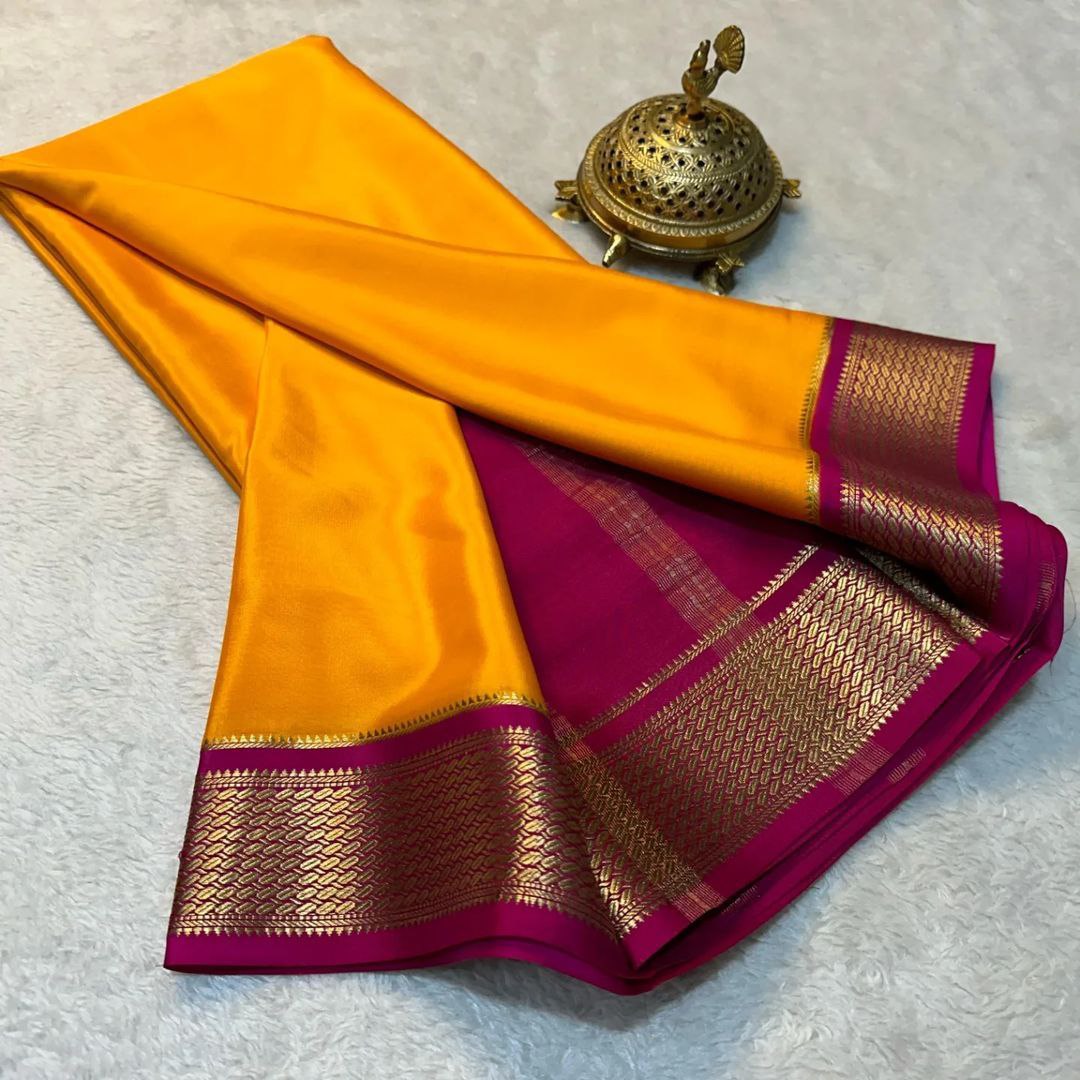 Exclusive  Zari Border Orange with Pink  Colour Plain Mysore Silk Saree.