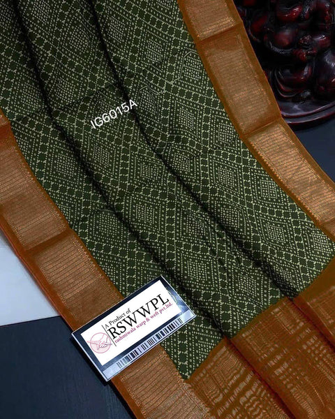 Stylish fancy Ikat print, vibrant Green colors, and intricate patterns.